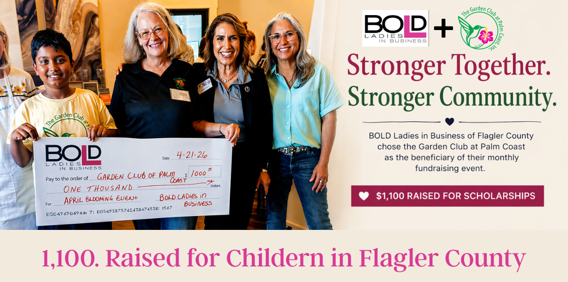 A group of smiling women at a community fundraising event in Palm Coast, Florida, stand together holding a large ceremonial check representing $1,100 raised by BOLD Ladies in Business Flagler County. The funds benefit the Garden Club at Palm Coast scholarship program. The event took place at Grand Pointe Apartments and included local vendors, food trucks, and community members coming together to support students and education initiatives.